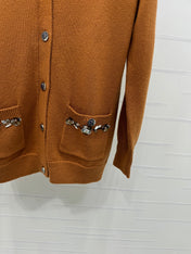 CHANEL HEAVY KNIT CARDIGAN WITH EMBELLISHED FLORAL DETAILS 274877