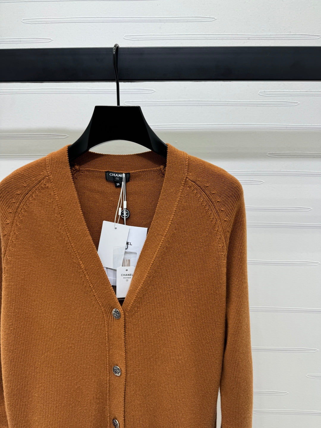 CHANEL HEAVY KNIT CARDIGAN WITH EMBELLISHED FLORAL DETAILS 274877