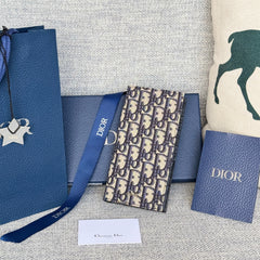 VERTICAL LONG WALLET 19 IN BLUE MONOGRAM OBLIQUE JACQUARD