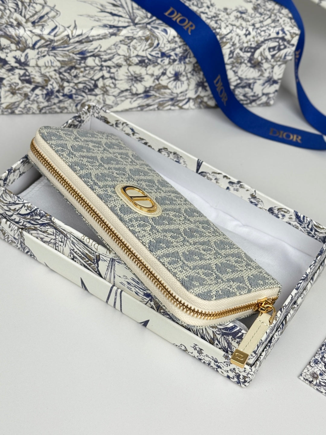 DIOR 25S LONG ZIPPER WALLET 19 IN LIGHT BLUE OBLIQUE JACQUARD CANVAS