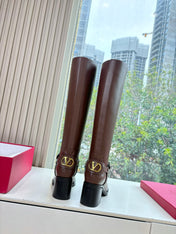 VALENTINO 25S HIGH-CUT SIGNATURE LOGO BOOTS 60 MM IN BROWN CALFSKIN WITH GOLD HARDWARE