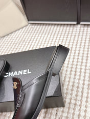 CHANEL 26S LOAFER MULES IN BLACK CALFSKIN