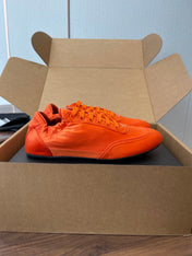 PRADA 25S SNEAKER IN ORANGE SILK