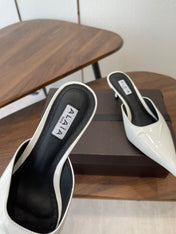 ALAIA 26S HEELED MULES 50 MM IN WHITE GLOSSY CALFSKIN