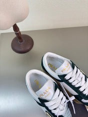 PRADA 26S DOWNTOWN THICK SOLE SNEAKERS IN WHITE CALFSKIN AND BLACK SUEDE
