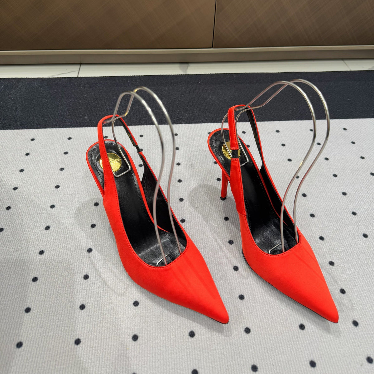 L'ENTRACTE SLINGBACK PUMPS IN RED SATIN