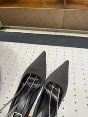 L'ENTRACTE SLINGBACK PUMPS IN BLACK SATIN