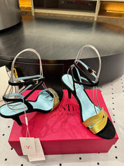 VLTN HIGH SANDAL 25S 60 MM IN BLACK SUEDE AND GOLD CALFSKIN