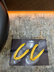 ALAIA 26S THONG SANDALS IN YELLOW SATIN AND TRANSPARENT PVC