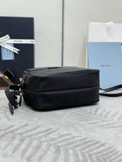 PRADA 25S RE-EDITION 1978 MINI 21 IN BLACK NYLON AND SAFFIANO CALFSKIN