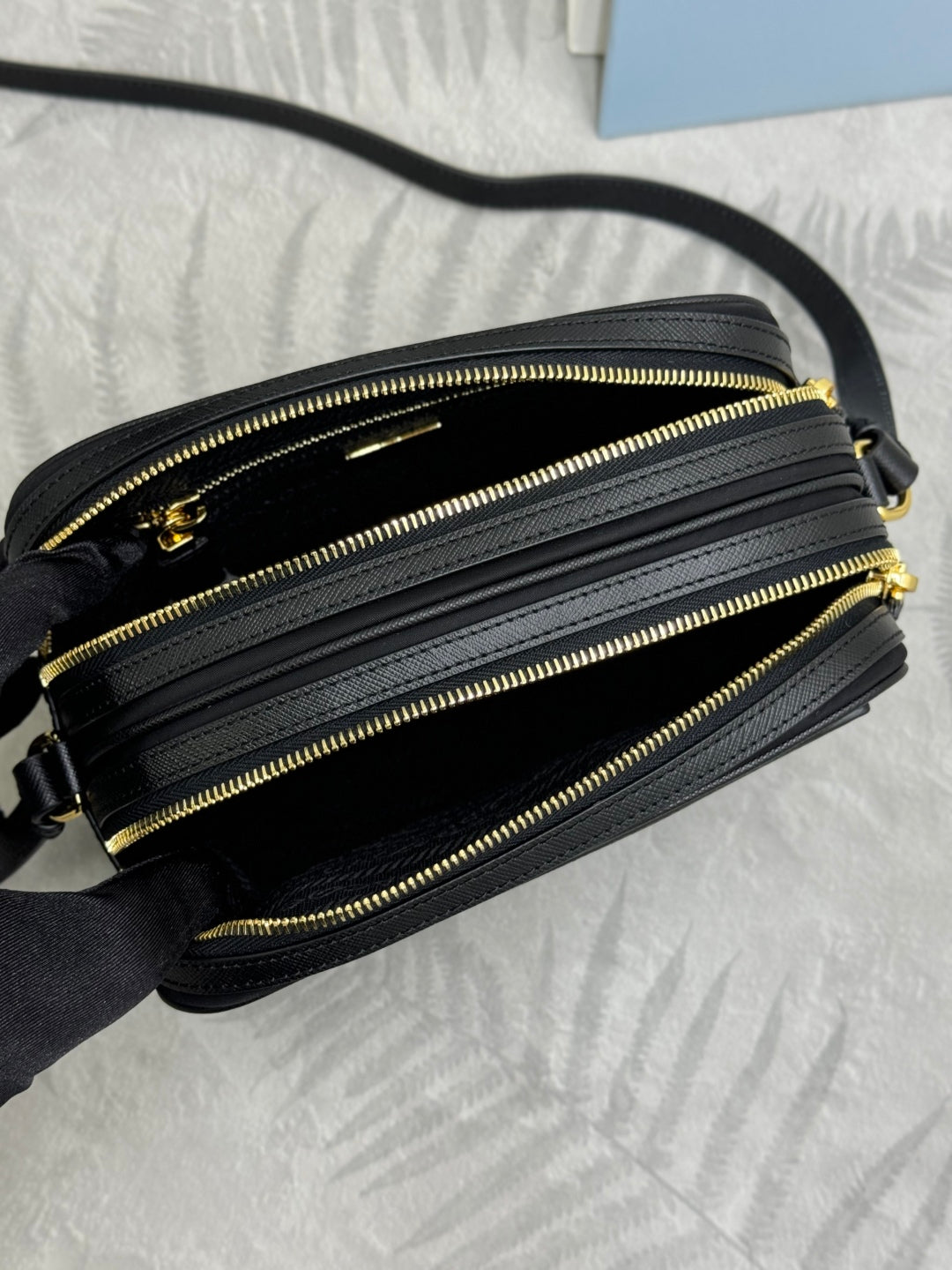 PRADA 25S RE-EDITION 1978 MINI 21 IN BLACK NYLON AND SAFFIANO CALFSKIN