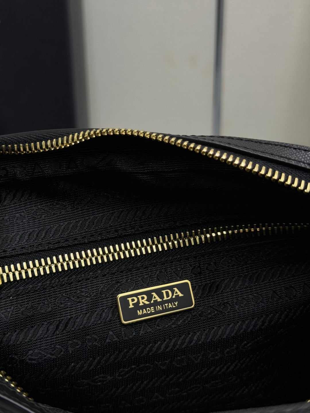 PRADA 25S RE-EDITION 1978 MINI 21 IN BLACK NYLON AND SAFFIANO CALFSKIN
