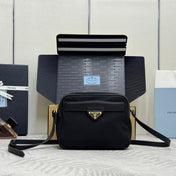 PRADA 25S RE-EDITION 1978 MINI 21 IN BLACK NYLON AND SAFFIANO CALFSKIN