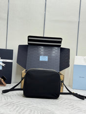 PRADA 25S RE-EDITION 1978 MINI 21 IN BLACK NYLON AND SAFFIANO CALFSKIN