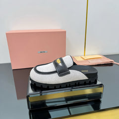 MULES SLIPPERS IN BLACK CALFSKIN AND WHITE DOTS CANVAS WITH GOLD COIN