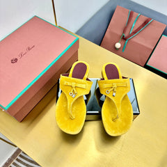 FLIP FLOPS IN YELLOW SUEDE AND HARDWARE SILVER