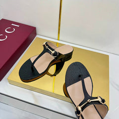 THONG SANDALS IN BLACK LAMBSKIN PRINTED LOGO WITH GOLD HARDWARE