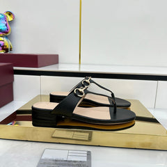 THONG SANDALS IN BLACK LAMBSKIN WITH GOLD HARDWARE