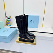 PRADA 25S TALL CHELSEA BOOTS 50MM IN BLACK GLOSSY CALFSKIN