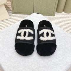 CHANEL 25S FUR SLIPPERS DOUBLE-LAYERED IN BLACK WITH WHITE CC LOGO