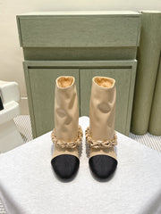 CHANEL 25S CALF-LENGTH BOOTS 45MM IN BEIGE AND BLACK CALFSKIN GOLD HARDWARE