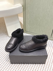 CHANEL 25S SHORT BOOTS IN BLACK CALFSKIN WITH SHEEPSKIN LINING