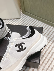CHANEL 25S LUXURY SNEAKERS IN WHITE CALFSKIN AND SUEDE
