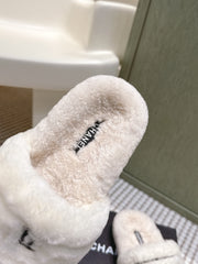 CHANEL 25S FLUFFY SLIDERS IN BEIGE AND WHITE