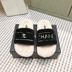 CHANEL 25S FLUFFY SLIDERS IN BEIGE AND BLACK