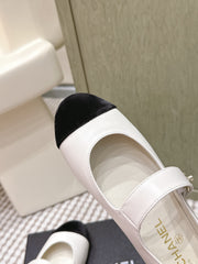 CHANEL 25S MARY JANE FLAT IN WHITE LAMBSKIN WITH BLACK VELVET CAP TOE