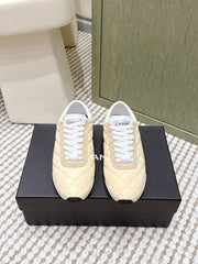 CHANEL 25S SNEAKERS IN LIGHT YELLOW CALFSKIN AND SUEDE