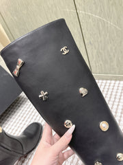 CHANEL 25S KNEE-HIGH BOOTS IN BLACK CALFSKIN WITH RHINESTONES