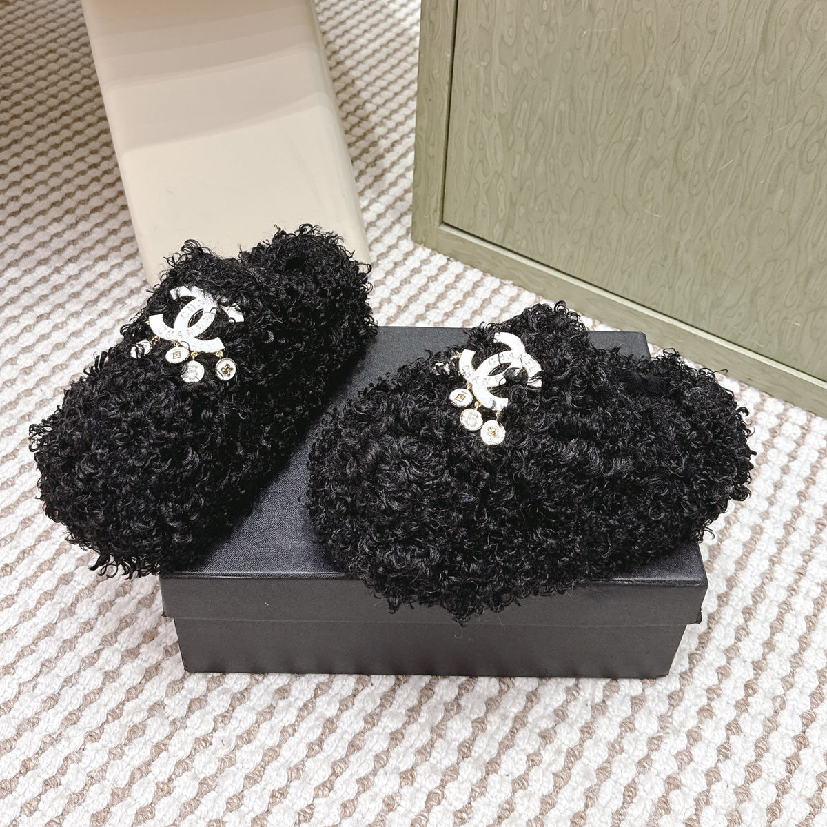 CHANEL 25S CLASSIC FURRY SLIDES IN BLACK WITH DOUBLE C LOGO