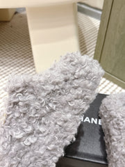 CHANEL 25S CLASSIC FURRY SLIDES IN GRAY WITH DOUBLE C LOGO