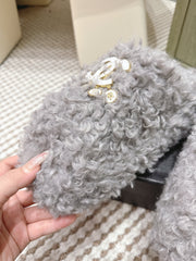 CHANEL 25S CLASSIC FURRY SLIDES IN GRAY WITH DOUBLE C LOGO