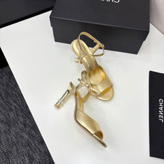 CC HIGH SANDAL 25S 80 MM IN GOLD CALFSKIN WITH PEARL DETAILS