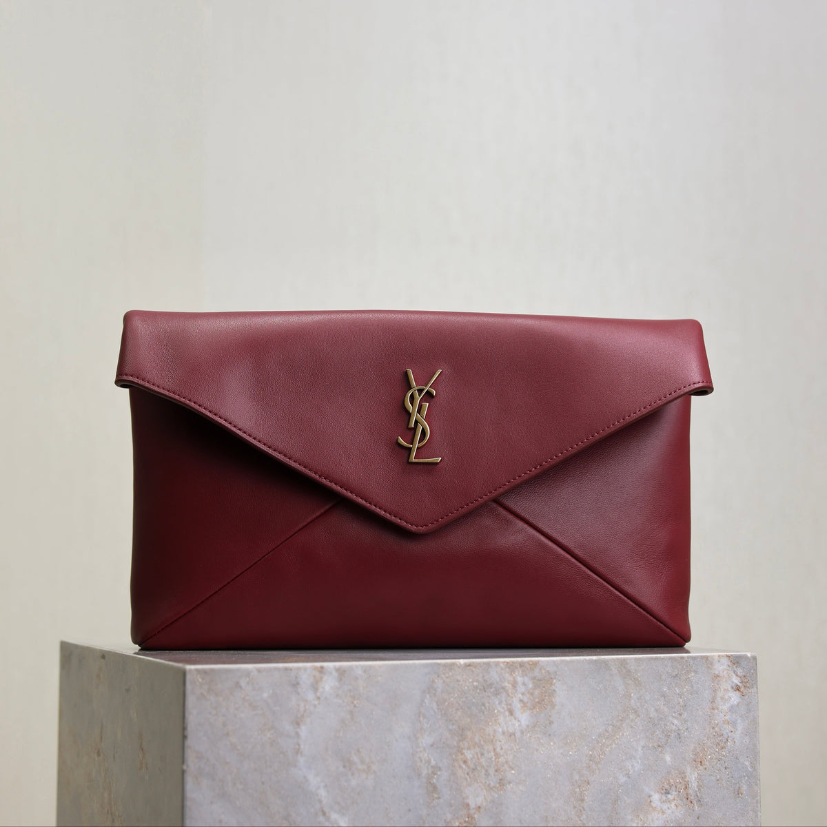 YSL 25S CASSANDRE LARGE ENVELOPE POUCH 29 IN DARK RUBY SHINY CALFSKIN GOLD HARDWRE