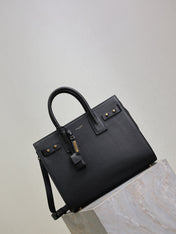 YSL 25S SAC DE JOUR GM 32 IN BLACK SUPPLE GRAINED CALFSKIN GOLD HARDWRE