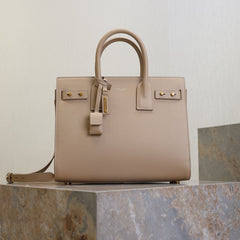 YSL 25S SAC DE JOUR GM 32 IN DARK BEIGE SUPPLE GRAINED CALFSKIN