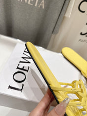 LOEWE 26S PETAL ANAGRAM SLIDE IN YELLOW CALFSKIN
