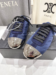 PRADA 25S MULES IN DARK BLUE WITH METAL TOECAP