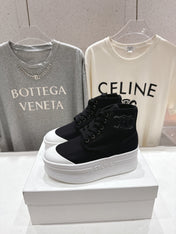 CELINE 26S BOOTS IN WHITE AND BLACK CANVAS