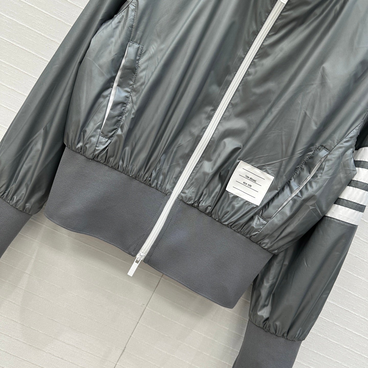 THOM BROWNE STAND COLLAR ZIP-UP JACKET IN GREY
