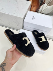 CELINE 25S GEORGIA SLIDE IN SHEARLING IN BLACK