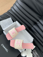 WOVEN SLIDE IN RAFFIA AND LIGHT PINK LAMBSKIN