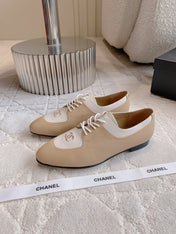 CHANEL 25S TWO TONE LACE UP IN BEIGE CALFSKIN