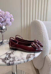 CHANEL 25S CAMELLIA SQUARE TOE FLATS IN ROSSO ANCORA CALFSKIN GOLD HARDWARE
