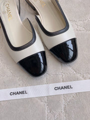 CHANEL 25S SLINGBACK IN BLACK AND WHITE CALFSKIN GOLD HARDWARE