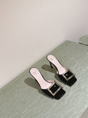 TRUMPET METALLIC MULES IN BLACK PATENT CALFSKIN