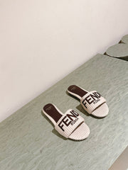 FENDI SIGNATURE MULE SLIDES IN WHITE FIBRE WITH BROWN EMBROIDERED LOGO